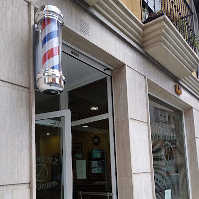 Logotipo de Domínguez Peluqueros
